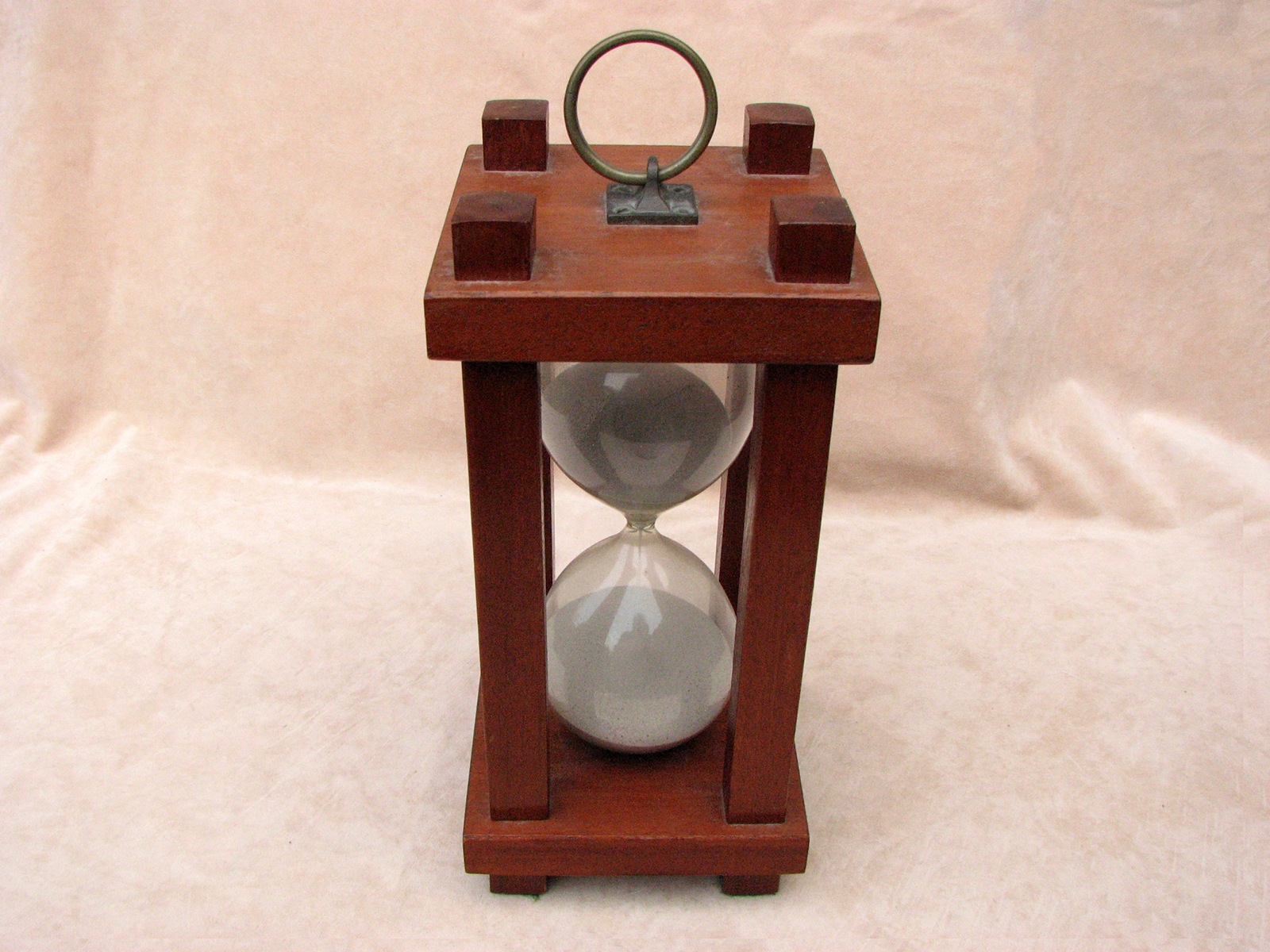 Large mid 20th century mahogany hourglass with square pillars